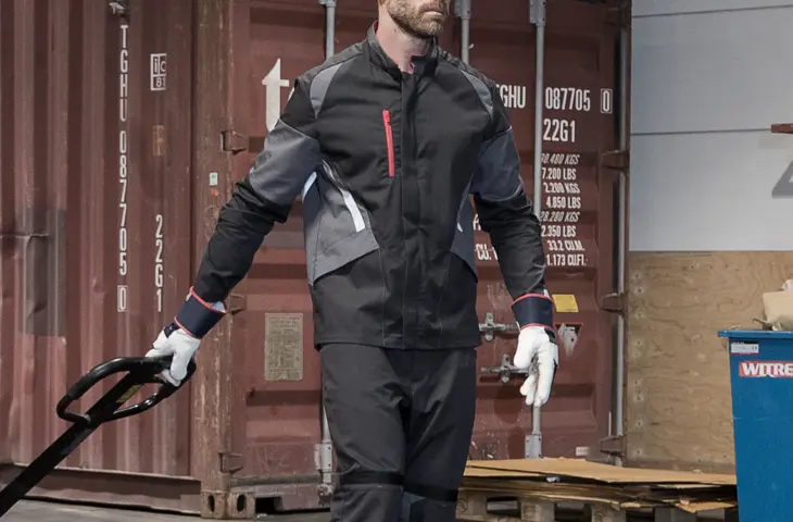 A man wearing an Arrow jacket