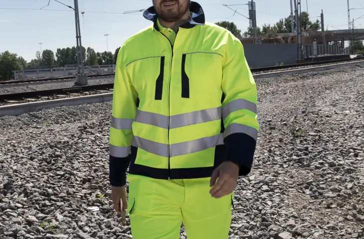 A man wearing an Epishine bomber jacket