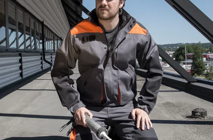 A man wearing an Epishock bomber jacket